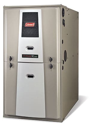 Precision Air technician installing a high-efficiency Coleman Gas Furnace in Tacoma