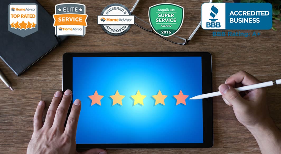 ratings Person rating services on tablet with five stars displayed.